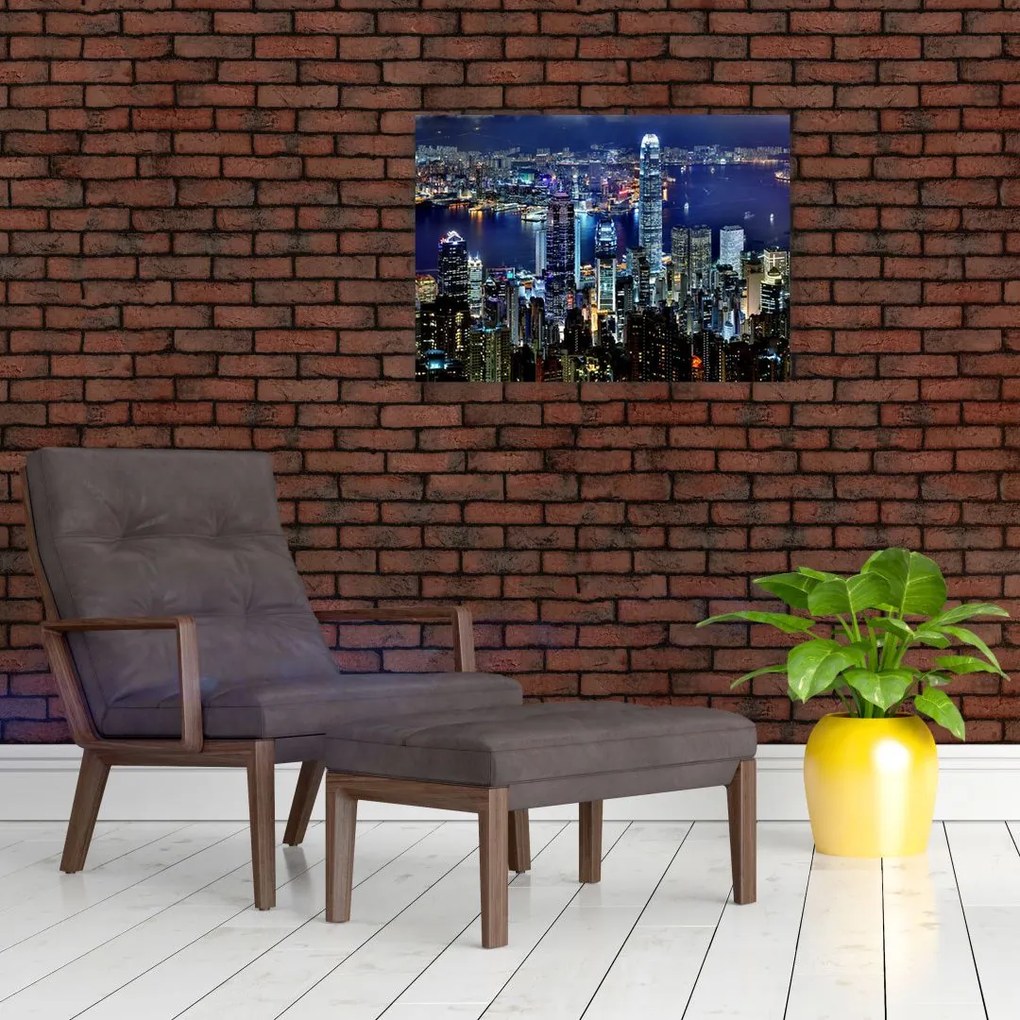 Obraz na szkle drapaczy chmur w nocy (70x50 cm)