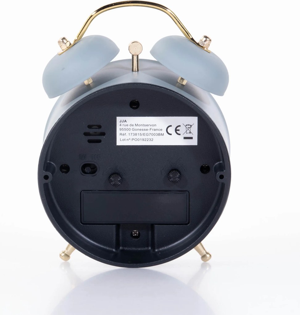 Zegarek budzik ze złotymi wskazówkami