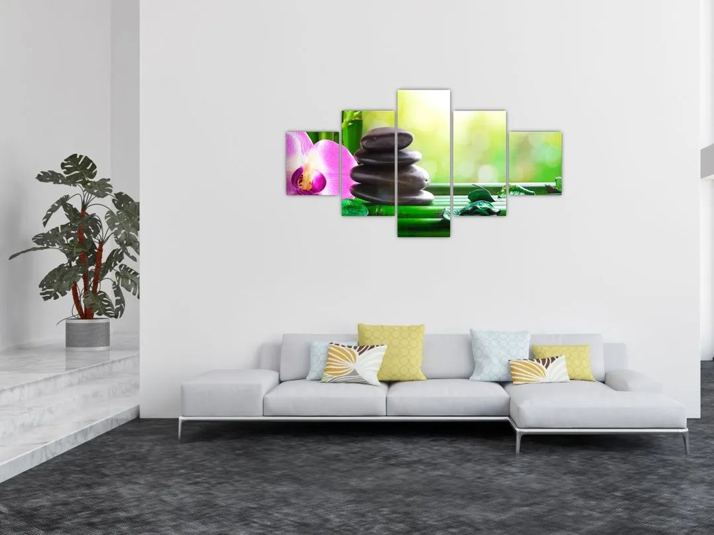 Obraz kamieni do masażu i storczyków na wodzie (125x70 cm)