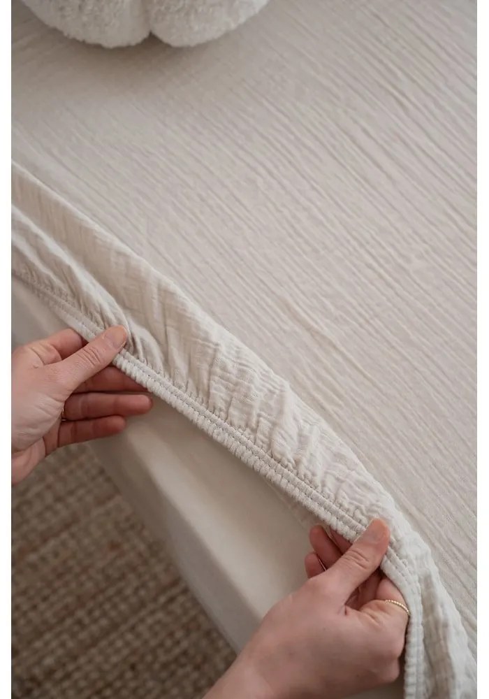 Beżowe prześcieradło dziecięce do łóżeczka muślinowe z gumką 60x120 cm Burumcuk – Mijolnir