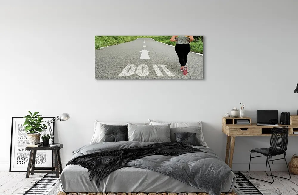 Obraz canvas na ścianę Kobieta Biegnąca Drogą