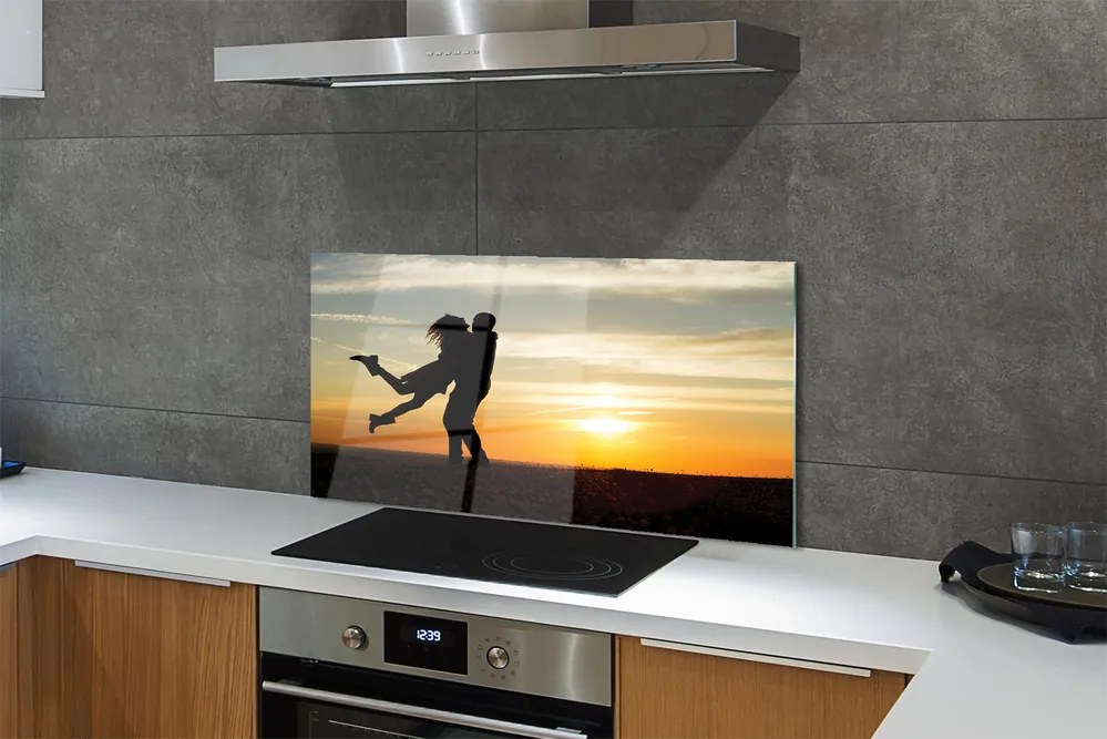 Panel szklany do Kuchni Ludzie na tle Wieczornych Chmur