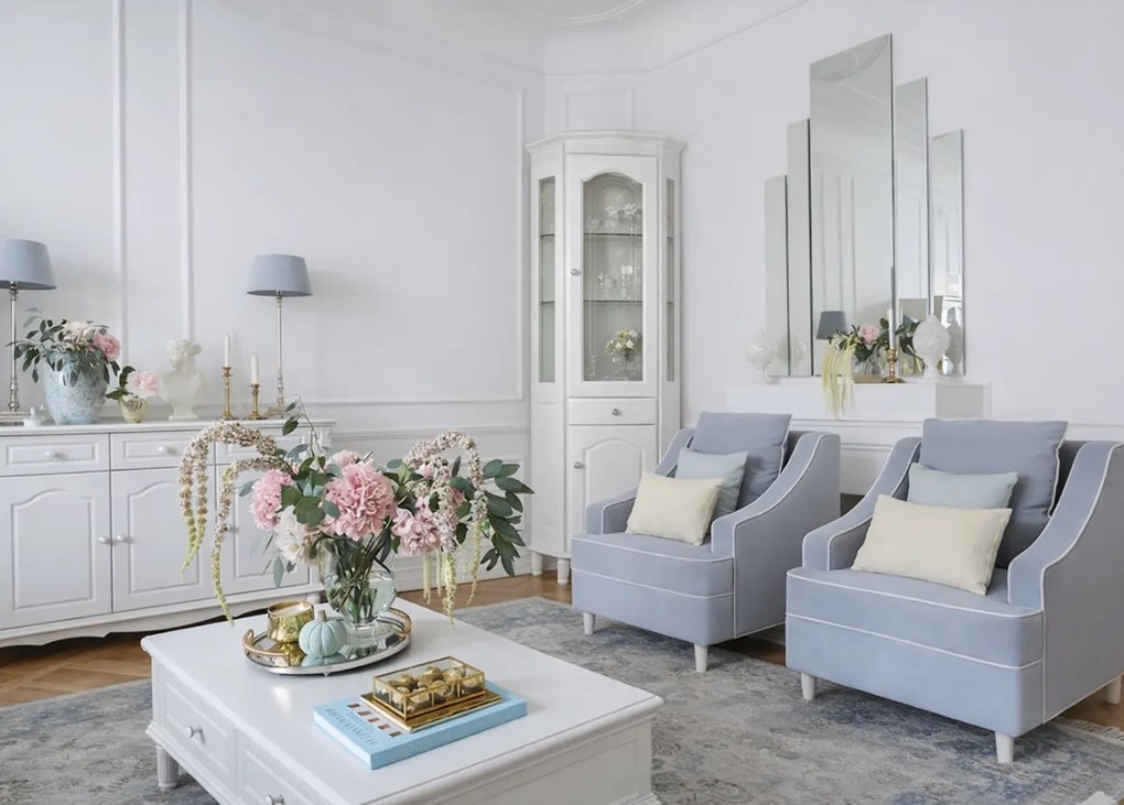 Witryna do salonu narożna biała Aria, wymiary 65x65x200 cm. Górna część przeszklona, dolna zamknięta. Witryna ma szafkę i szufladę. Angielski styl.