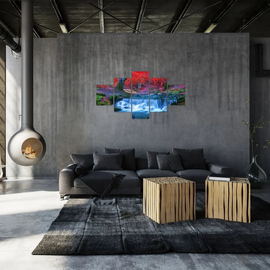 Obraz wodospadu w czerwonym lesie (125x70 cm)
