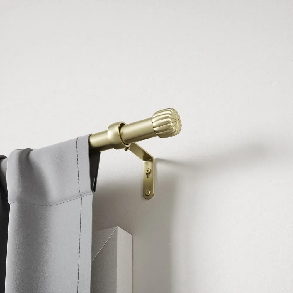Stalowy regulowany karnisz w kolorze złota 91 - 168 cm Cleo – Umbra