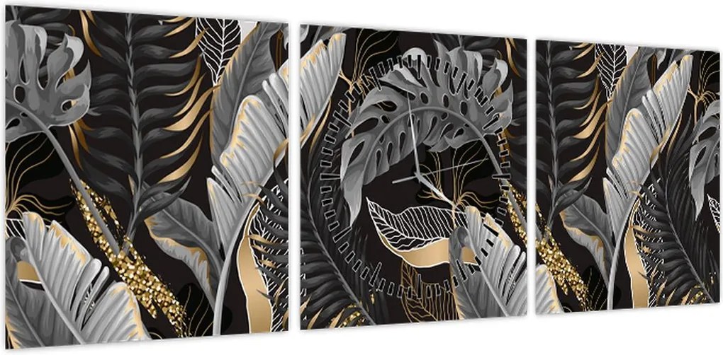 Obraz - Tropikalne liście w kolorze czarno - złotym (z zegarem) (90x30 cm)