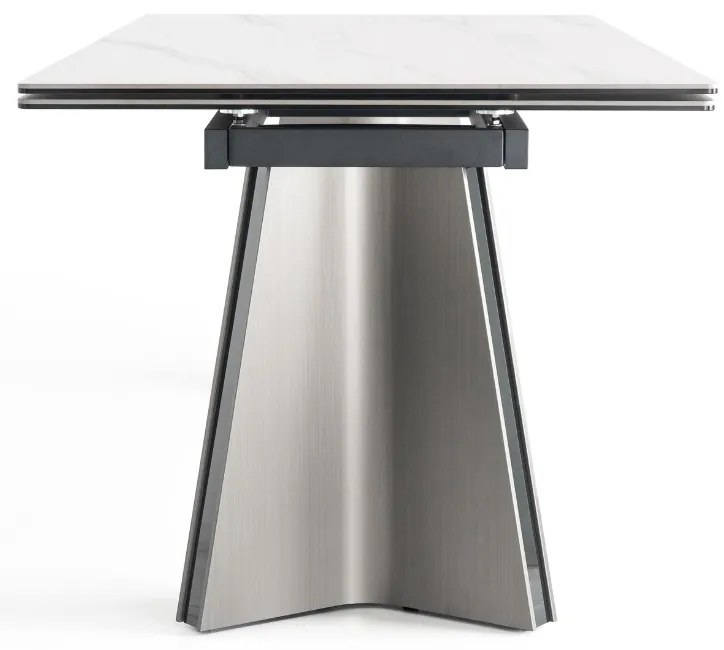 Nowoczesny stół rozkładany Nexus o wymiarach 200(280)×90 cm zachwyca eleganckim blatem z masy ceramicznej i solidną podstawą ze stali szczotkowanej. Styl, trwałość i funkcjonalność w jednym – idealny do jadalni i salonu.
