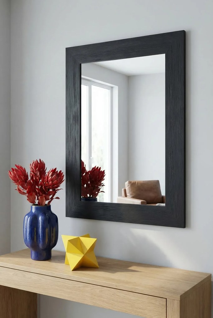 Czarne lustro wiszące w drewnianej ramie E6-T66