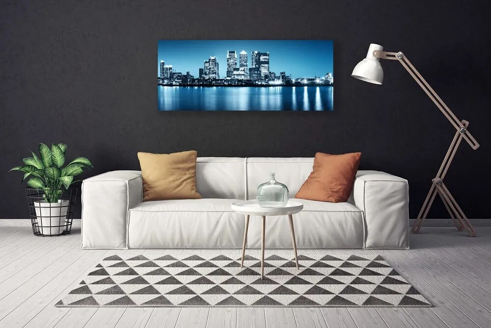 Duży obraz na płótnie Sylwetka Miejskich Wieżowców