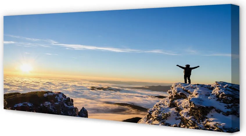 Obraz canvas na ścianę Człowiek w Górach o Wschodzie