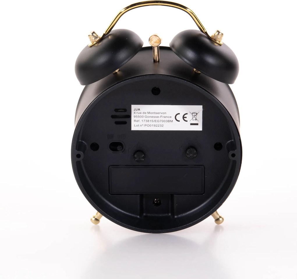 Zegarek budzik ze złotymi wskazówkami