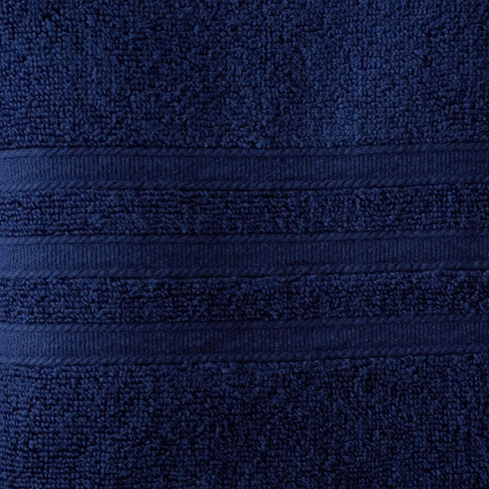 Ciemnoniebieskie bawełniane ręczniki kąpielowe frotte zestaw 2 szt. 90x140 cm Zero Twist – Catherine Lansfield