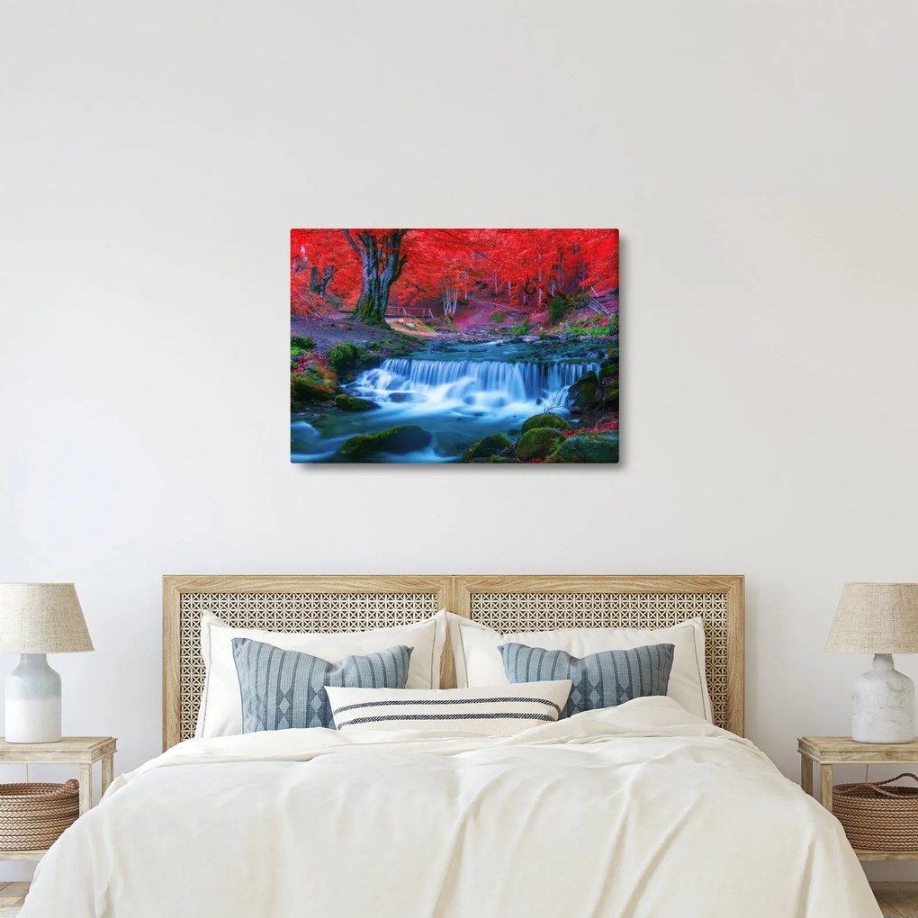 Obraz wodospadu w czerwonym lesie (70x50 cm)
