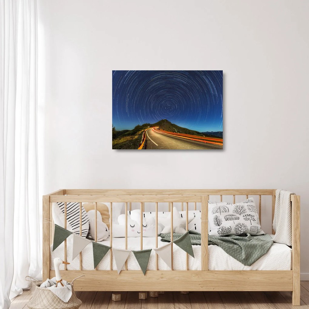 Obraz na szkle obracających się gwiazd (70x50 cm)
