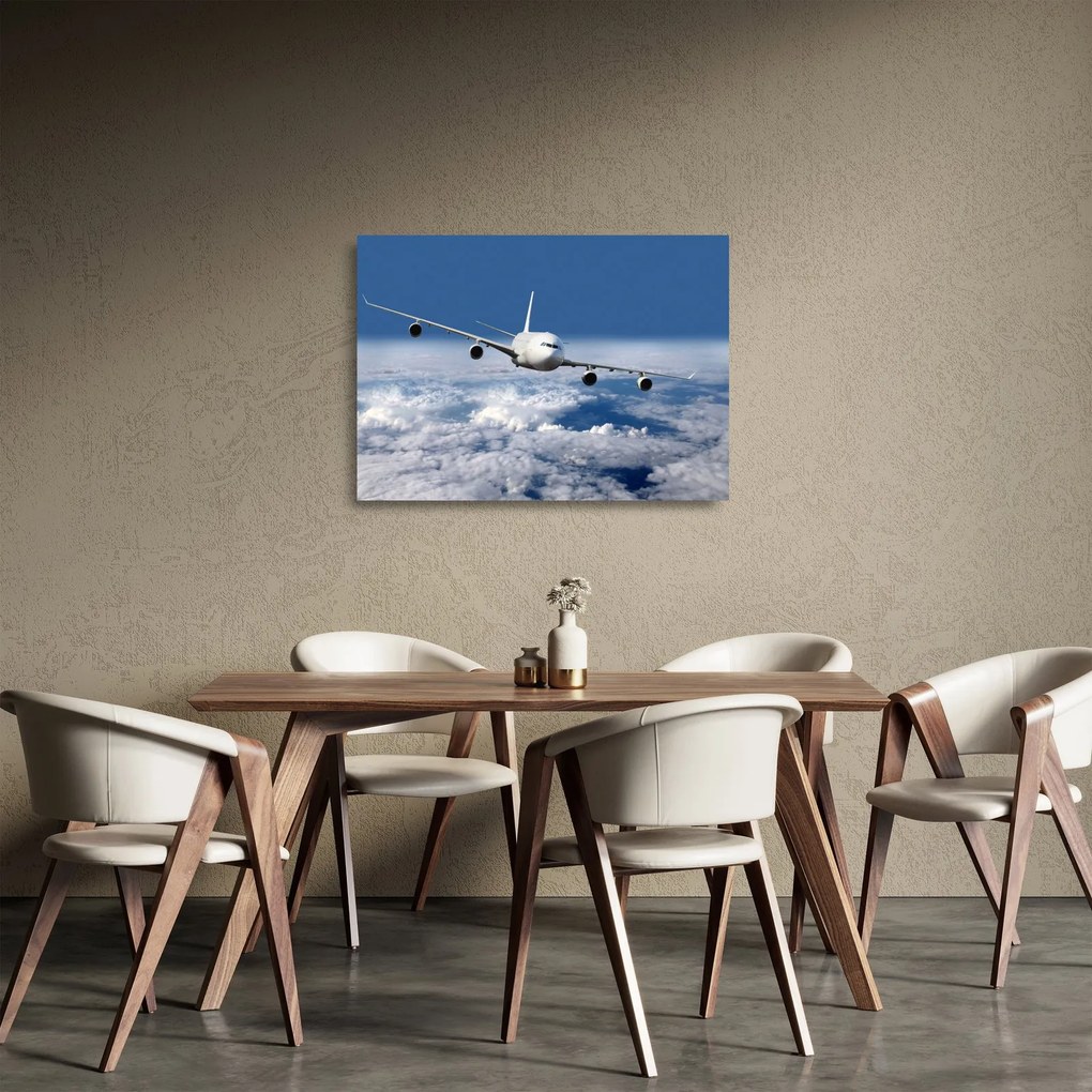 Obraz na szkle - Samolot w chmurach (70x50 cm)