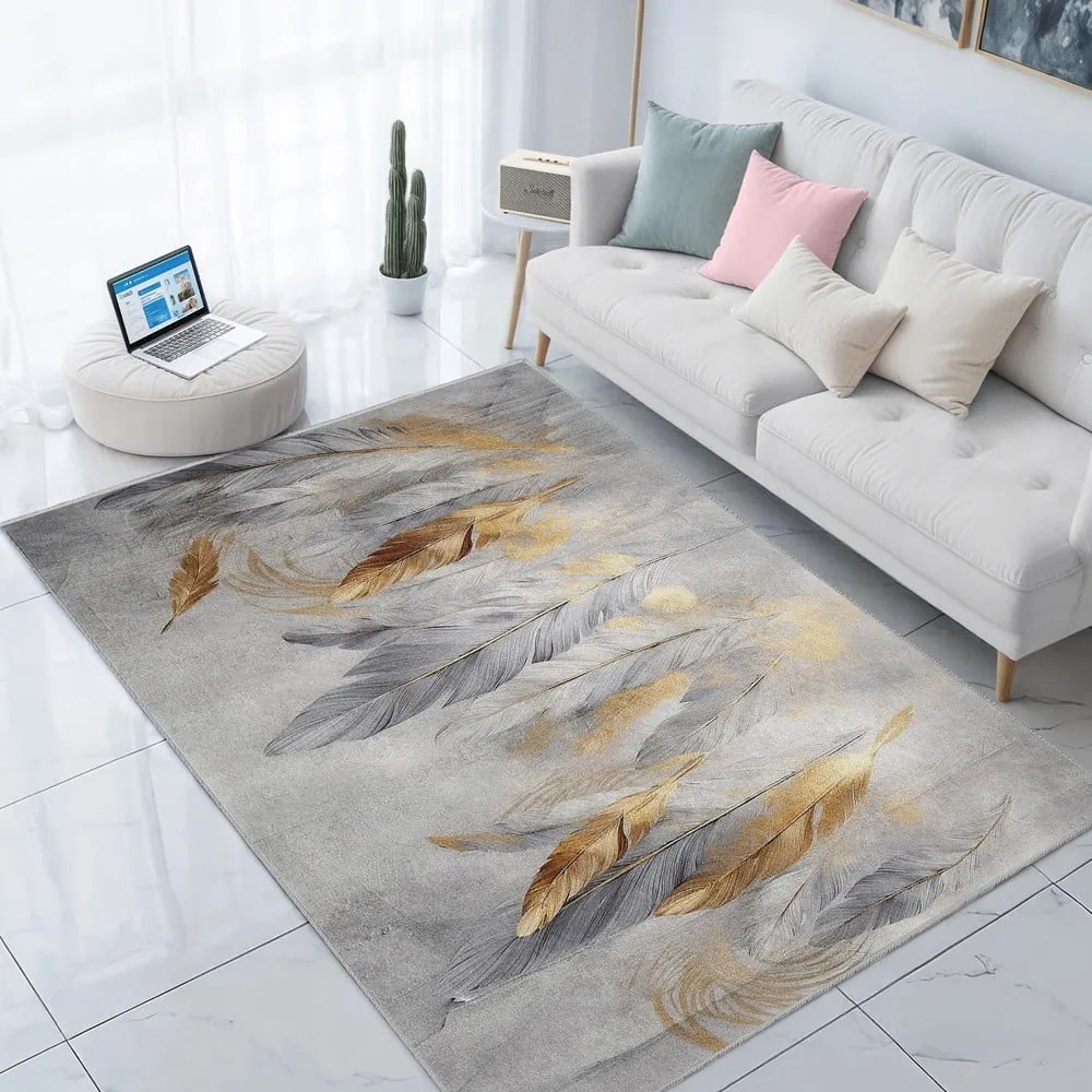 Dywan w szaro-złotym kolorze odpowiedni do prania 120x180 cm Golden Feathers – Mila Home