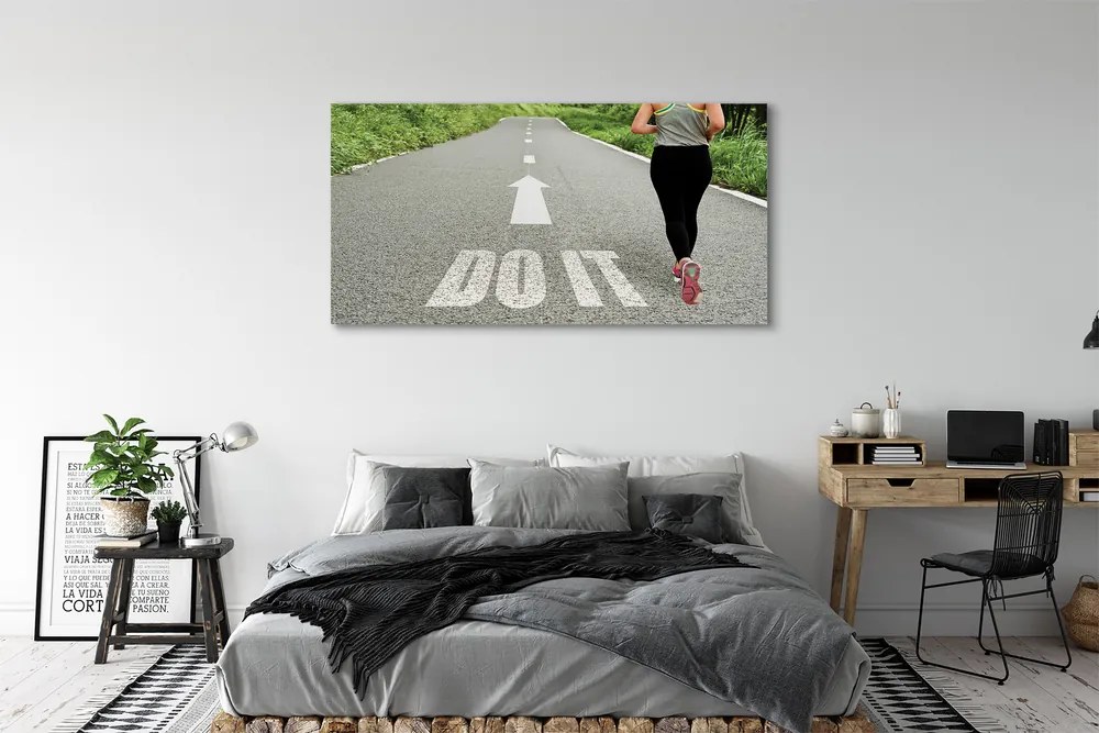 Obraz canvas na ścianę Kobieta Biegnąca Drogą