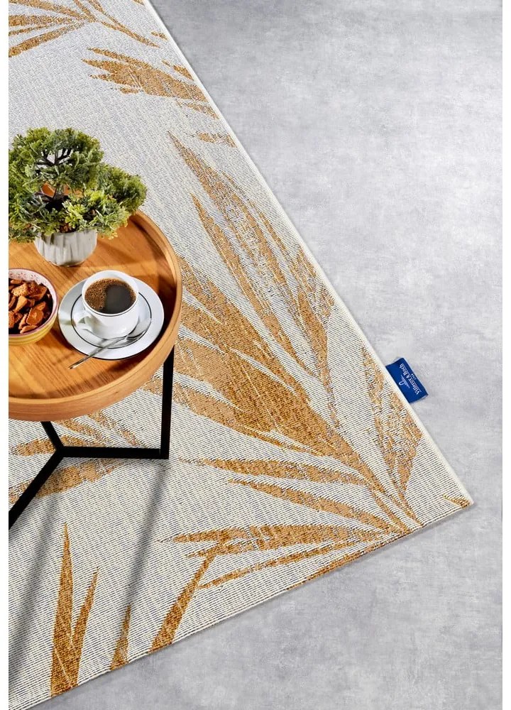 Dywan w biało-złotym kolorze odpowiedni na zewnątrz 200x285 cm Leonie – Villeroy&amp;Boch