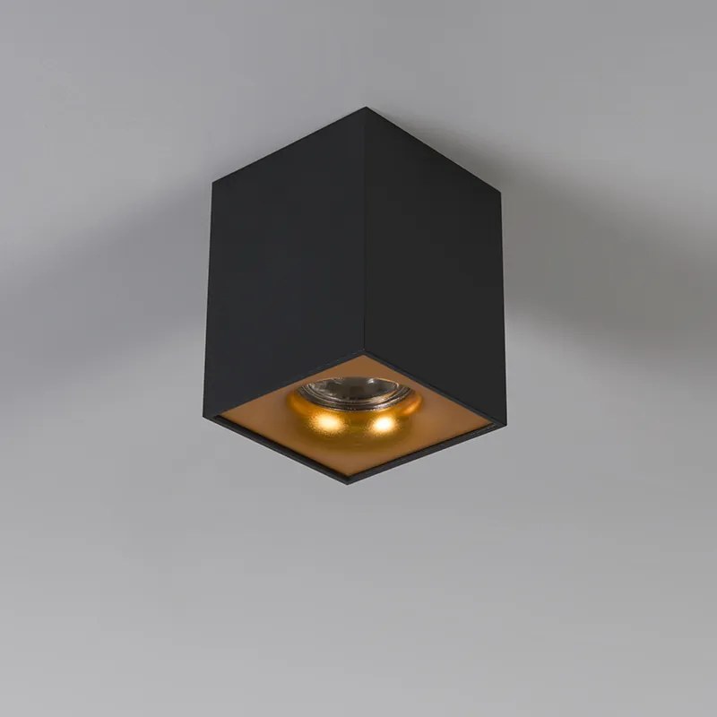 Nowoczesny reflektor czarny ze złotem - Quba Delux