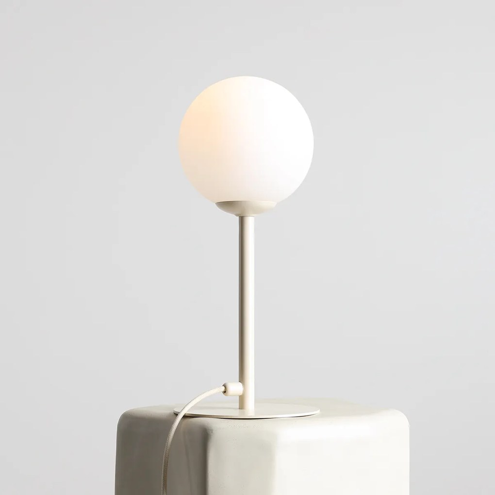 Nowoczesna i elegancka lampa stołowa Pinne w kolorze kremowym