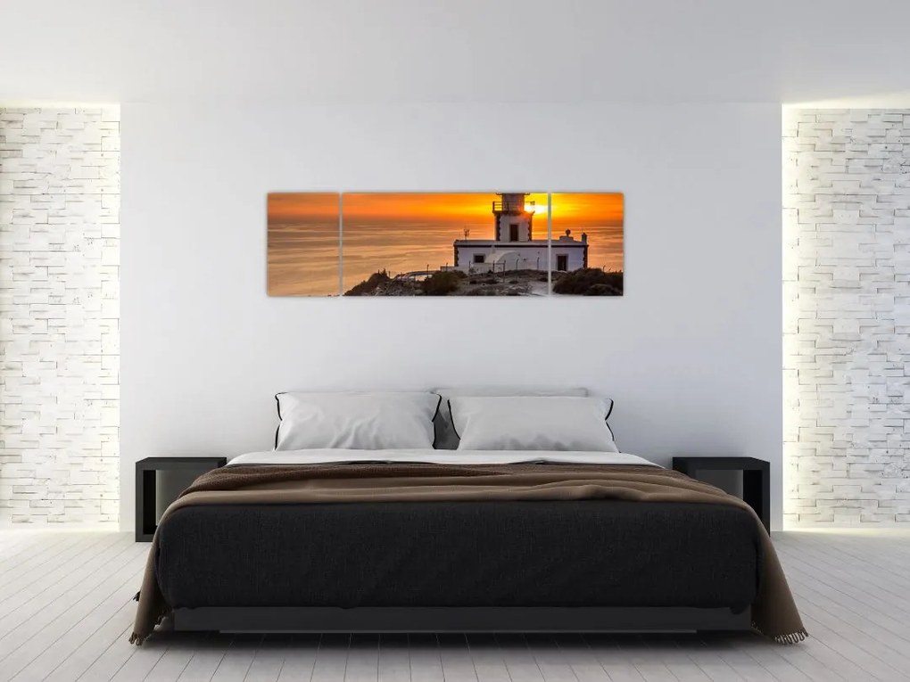 Obraz latarni morskiej o zachodzie słońca (170x50 cm)