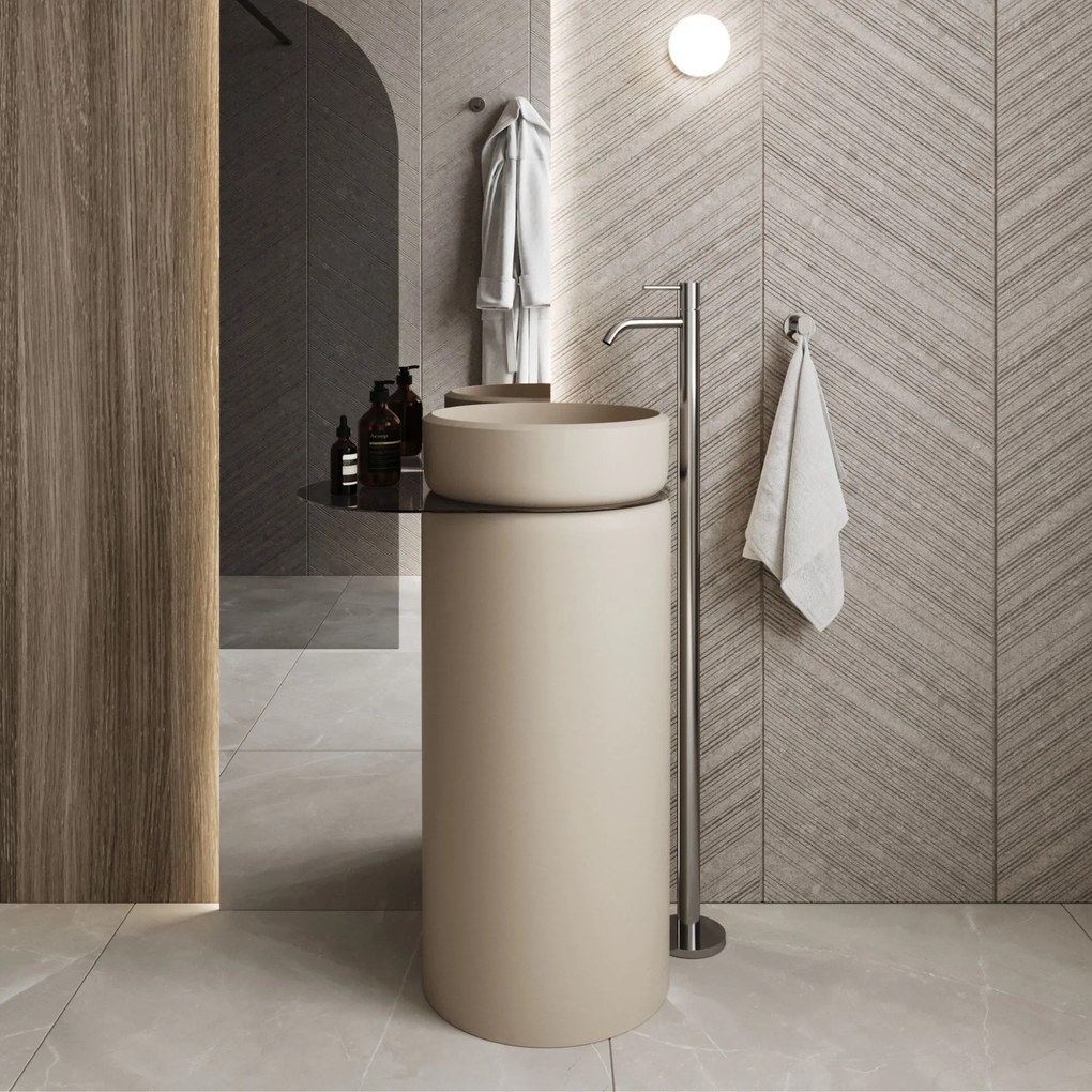 Umywalka z konglomeratu wolnostojąca okrągła z półką szklaną 85 x 40 cm RONA bez przelewu | Różne kolory półki : Kolor szkła - Grafitowy, Kolor umywalki RONA - Beż połysk, Podłączenie syfonu - Do podłogi, Półka - Szklana