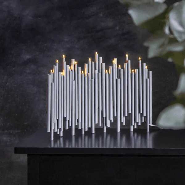 Szary świecznik LED o nietypowym designie
