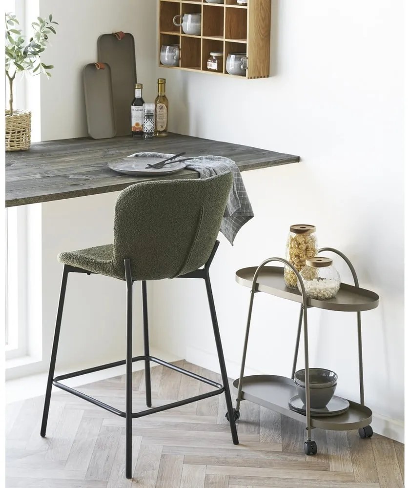 Ciemnozielony tapicerowany hoker (wysokość siedziska 65 cm) Maceda – House Nordic