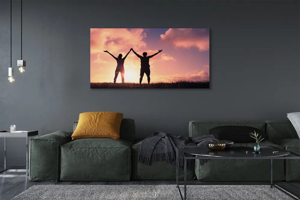 Fotoobraz na płótnie Ludzie o Zachodzie Słońca