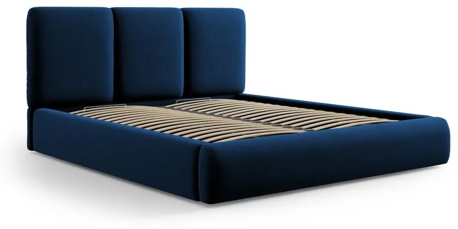 Ciemnoniebieskie aksamitne tapicerowane łóżko dwuosobowe ze schowkiem i stelażem 180x200 cm Brody – Mazzini Beds