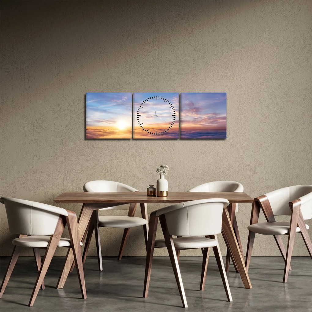 Obraz - Zachód słońca ponad chmurami (z zegarem) (90x30 cm)