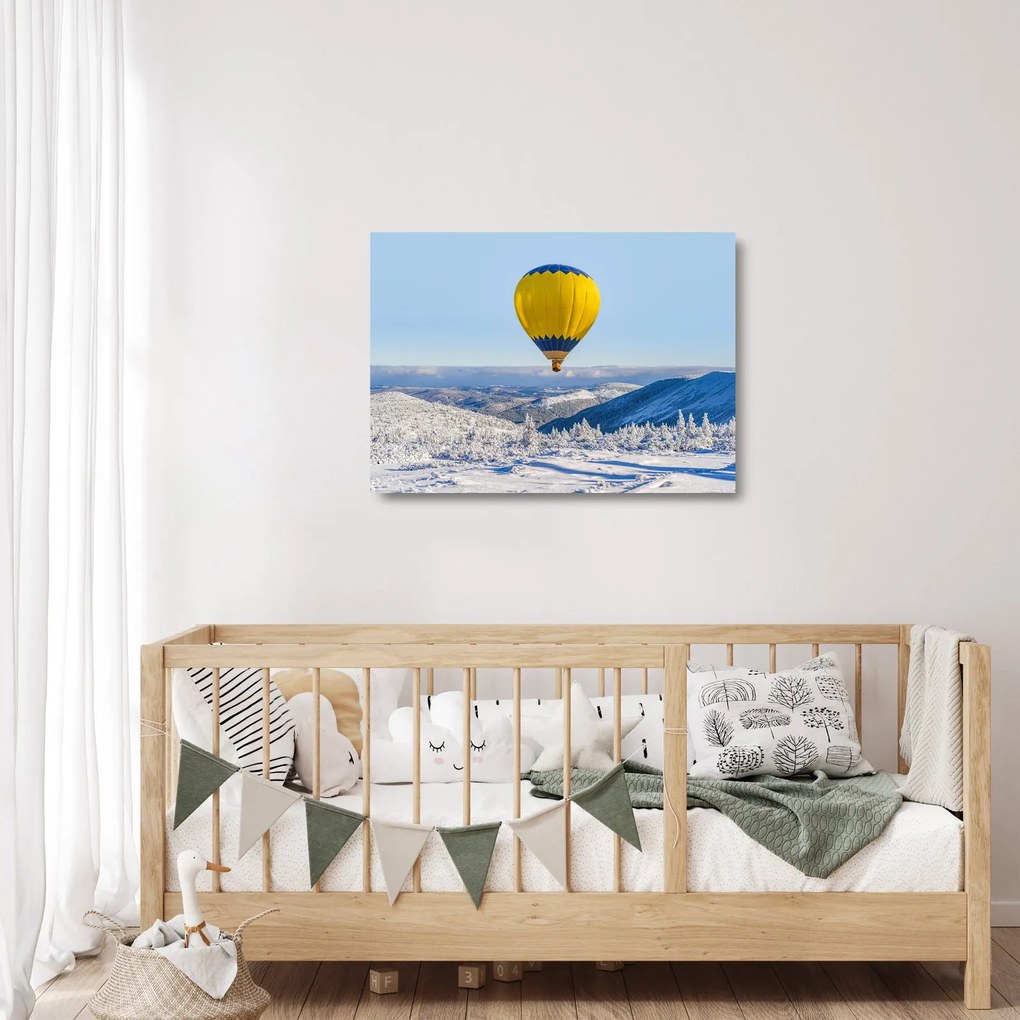 Obraz na szkle - Lot nad zimowym krajobrazem (70x50 cm)