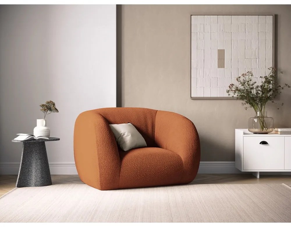 Pomarańczowy fotel z materiału bouclé Essen – Cosmopolitan Design