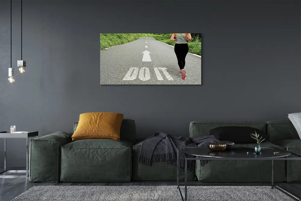 Obraz canvas na ścianę Kobieta Biegnąca Drogą