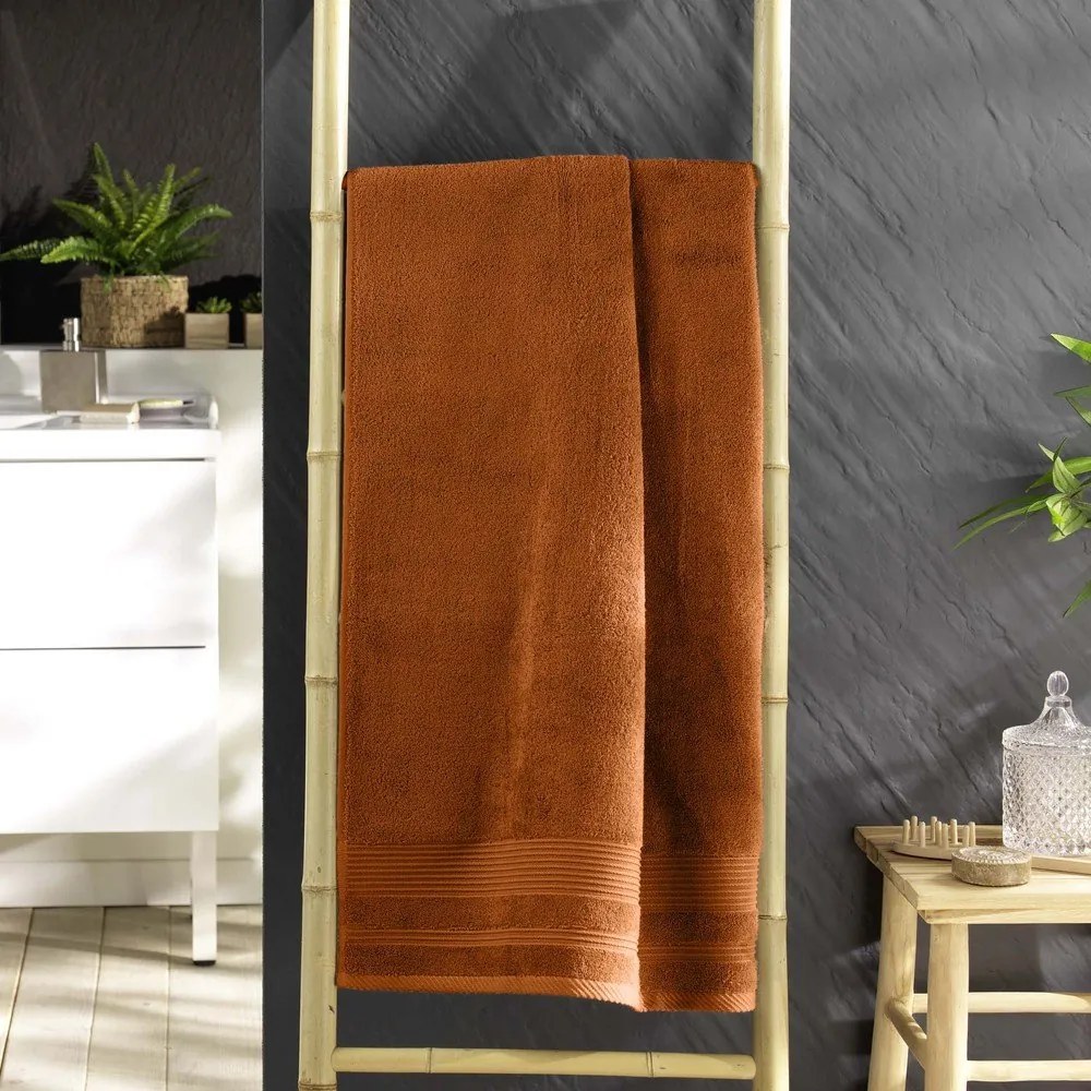 Bawełniany ręcznik kąpielowy frotte w kolorze terakoty 70x130 cm Tendresse – douceur d'intérieur