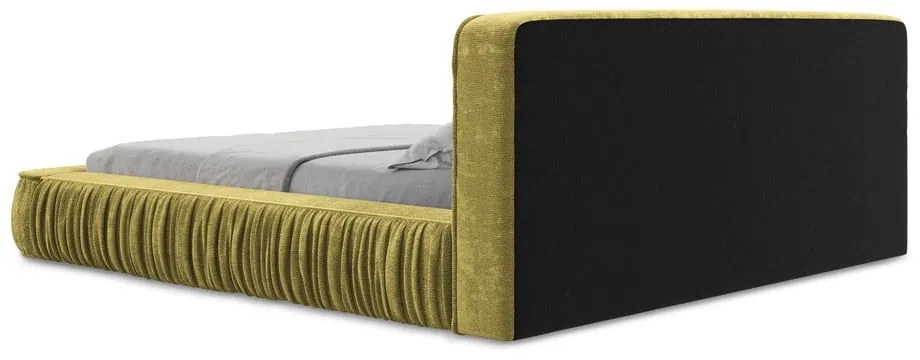 Żółte tapicerowane łóżko dwuosobowe ze schowkiem i stelażem 180x200 cm Keoni – Makamii