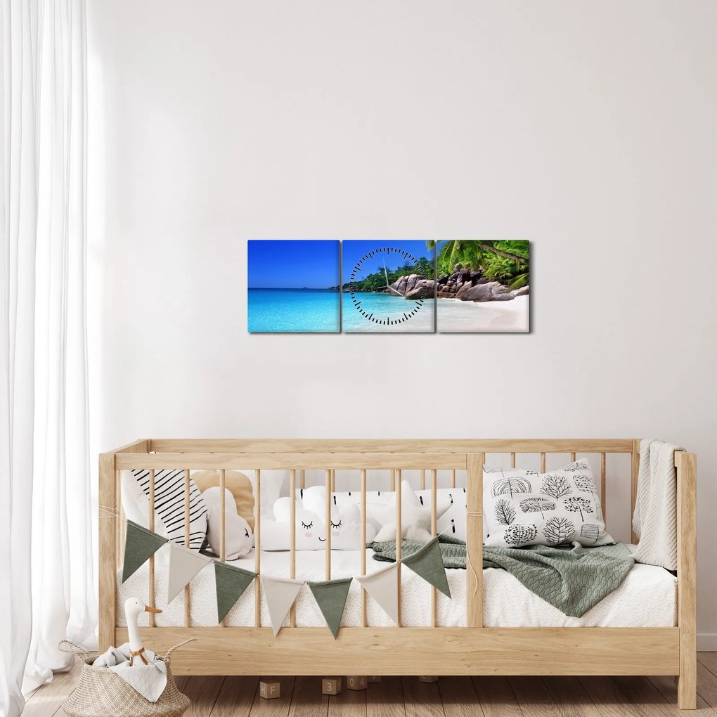 Obraz plaży na wyspie Praslin (z zegarem) (90x30 cm)