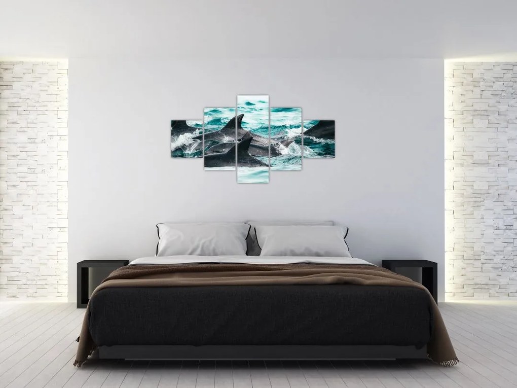 Obraz - Delfiny w oceanie (125x70 cm)