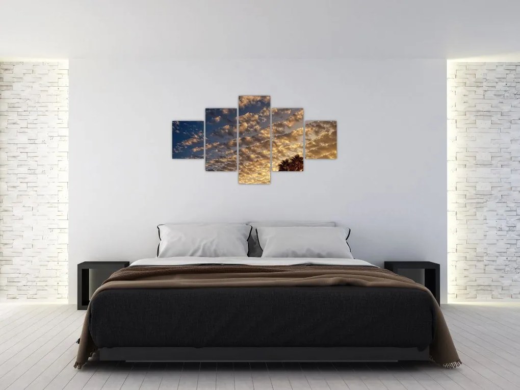 Obraz - palmy pośród chmur (125x70 cm)