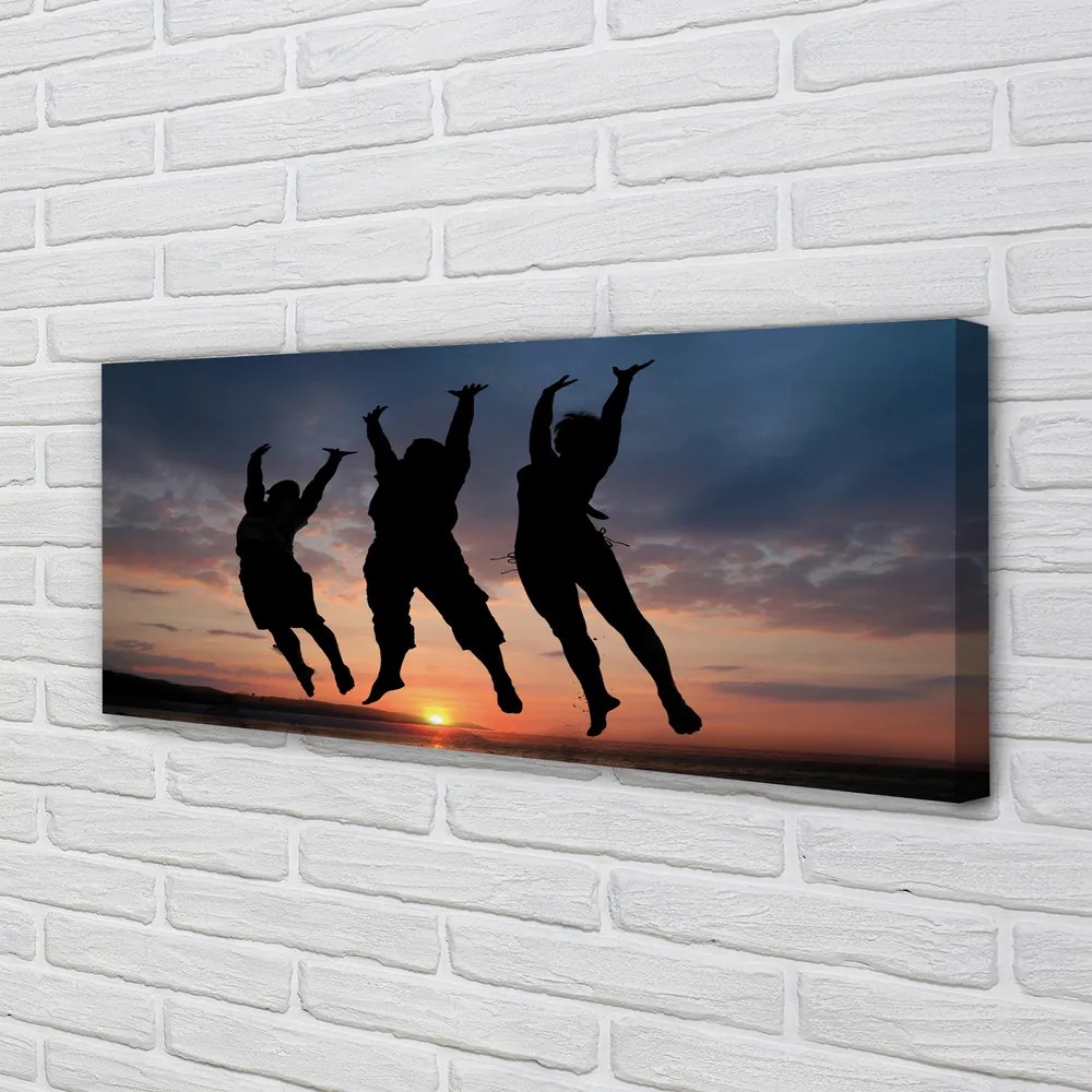 Fotoobraz na płótnie Ludzie na Tle Zachodu i Chmur