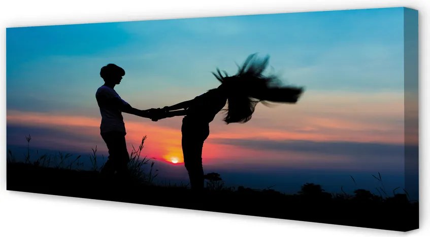 Fotoobraz na płótnie Ludzie na Tle Zachodu Nieba