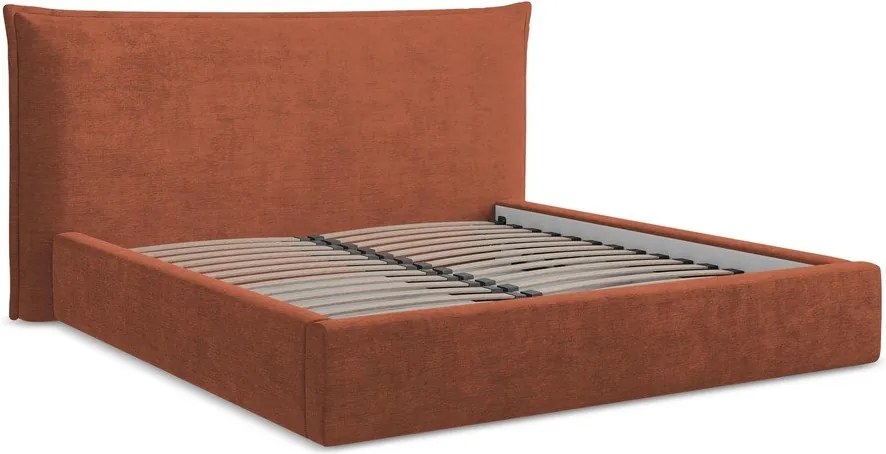 Tapicerowane łóżko dwuosobowe w kolorze terakoty ze schowkiem i stelażem 160x200 cm Esala – Makamii