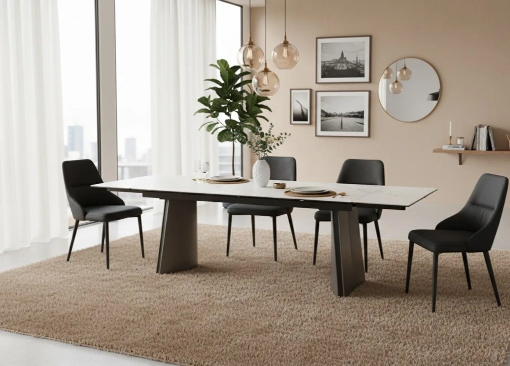 Nowoczesny stół rozkładany Nexus o wymiarach 200(280)×90 cm zachwyca eleganckim blatem z masy ceramicznej i solidną podstawą ze stali szczotkowanej. Styl, trwałość i funkcjonalność w jednym – idealny do jadalni i salonu.
