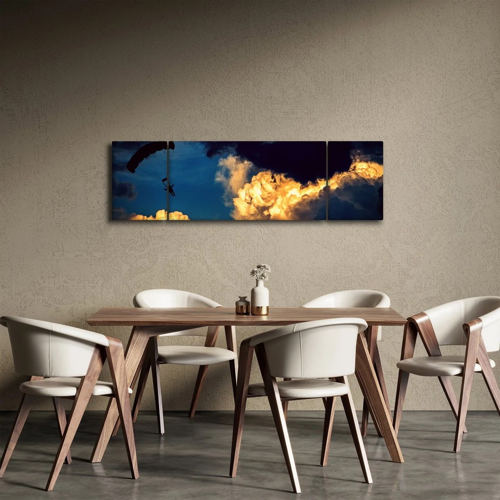 Obraz skoczka spadochronowego w chmurach (170x50 cm)