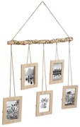 Zestaw ramek na zdjęcia, zawieszonych na drewnianej gałązce