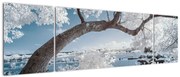 Obraz ośnieżonego drzewa nad wodą (170x50 cm)