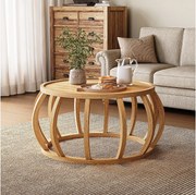 Stolik kawowy z litego drewna, okrągły stolik centralny o średnicy 80 cm z zakrzywioną podstawą ramy