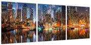 Obraz Manhattanu w nocy (z zegarem) (90x30 cm)