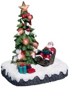 Miasteczko bożonarodzeniowe, scenka świąteczna z Mikołajem pod choinką