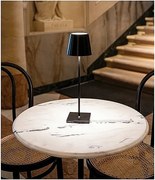 Lampa stołowa LED Poldina Pro Black, ładowalna i ściemnialna, z czasem pracy baterii do 12 godzin. Nadaje się do użytku na zewnątrz, IP65.